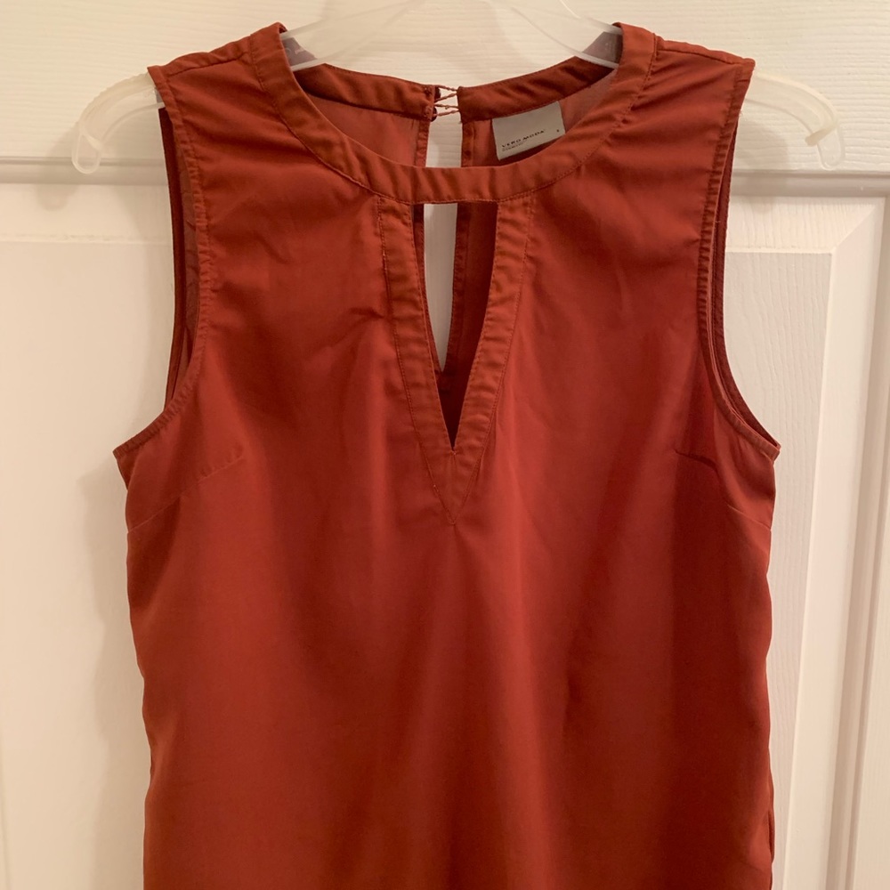 Rust colored tank top.